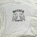 White graphic shirt with two wearable pumps featured and skeleton hands holding the pumps. "Mother Pumper" design.